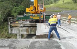 Bridge decks being removed after being cut